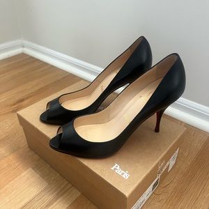 Christian Louboutin peep toe shoes.